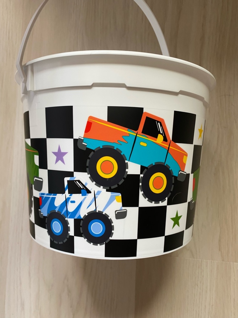Celebrate It White Toy Bucket with Blue and Orange Monster Trucks